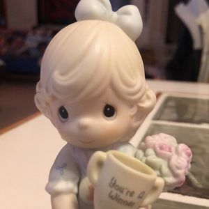 Precious moments with trophy.